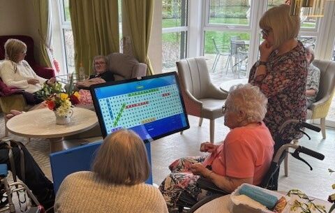 Nicky, Home Manager at Castle Grange with the interactive table